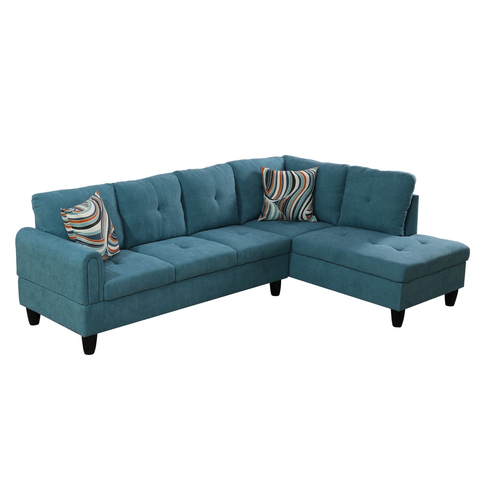 Teal fabric sectional sofa with tufted cushions and decorative throw pillows