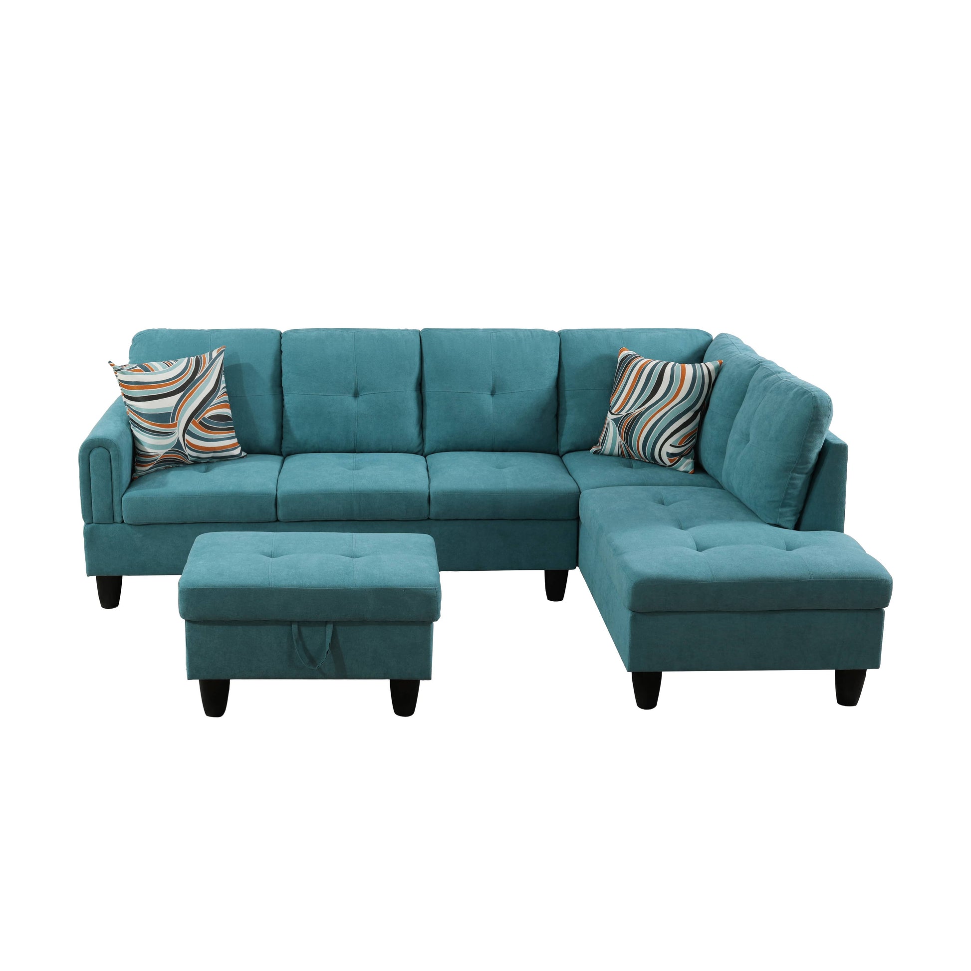 Teal fabric sectional sofa with tufted cushions and decorative pillows