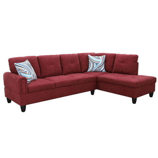 Deep red fabric sectional sofa with two decorative pillows