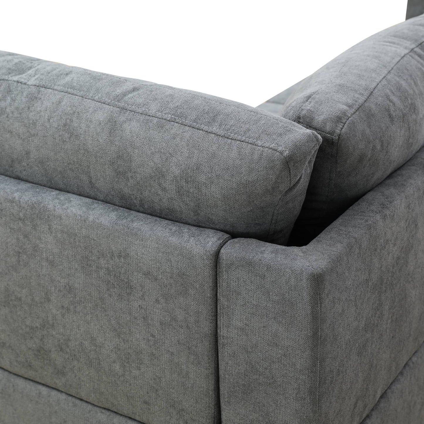Closeup of grey fabric sofa armrest with textured detail
