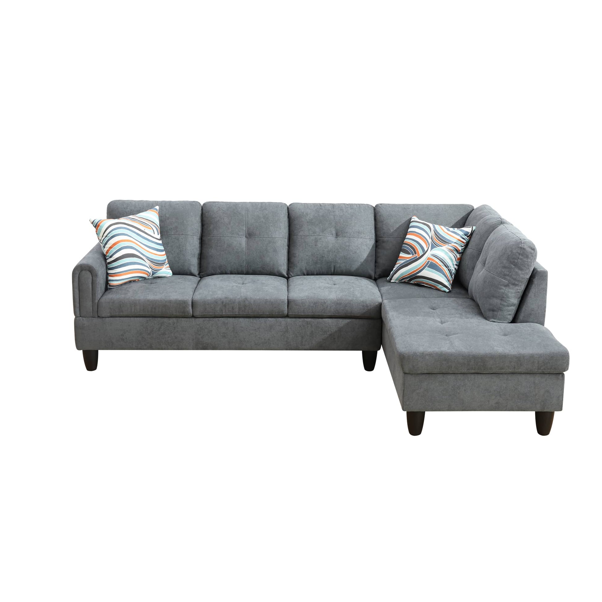 Gray fabric sectional sofa with tufted cushions and striped throw pillows