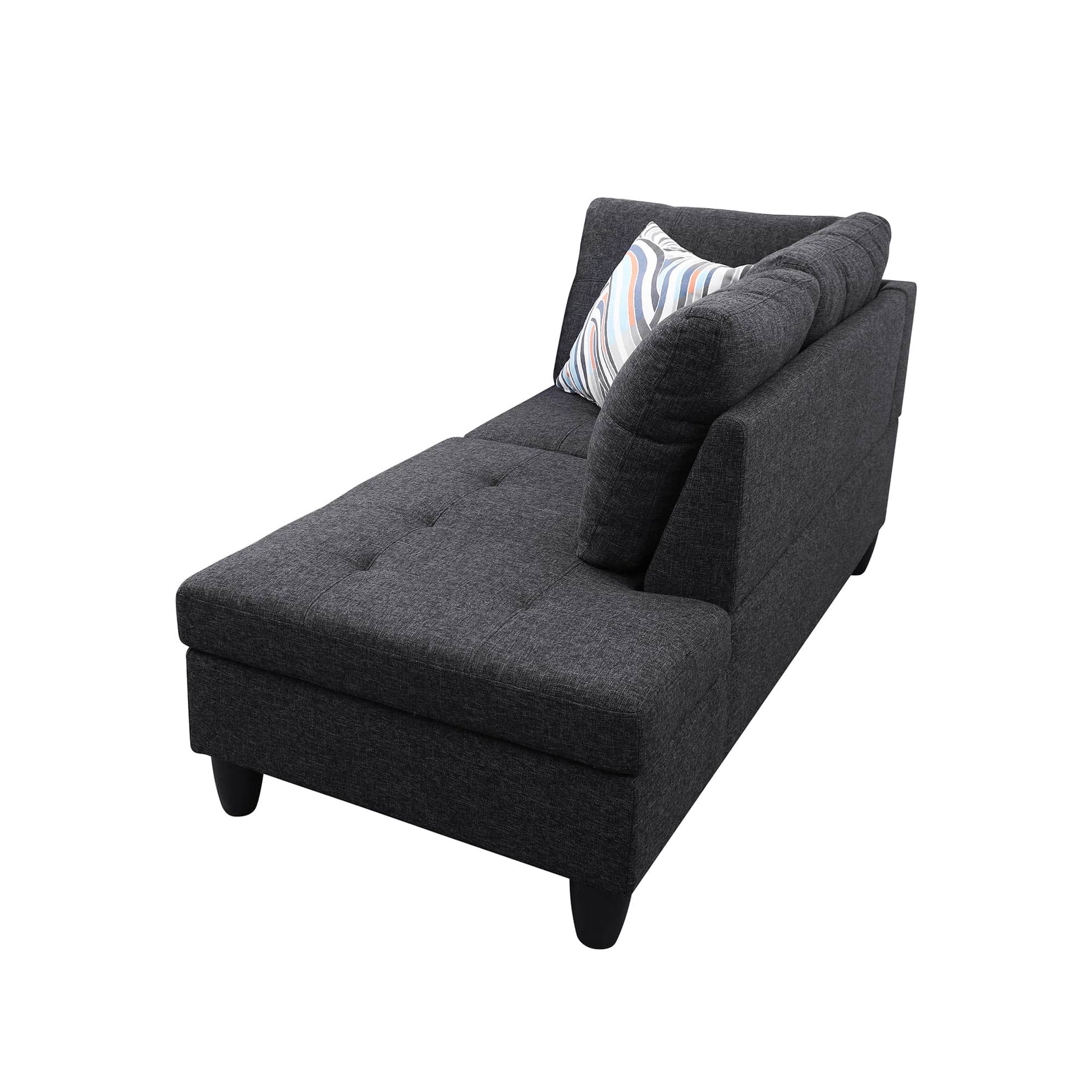 Dark gray fabric chaise lounge with tufted seat and striped accent pillow