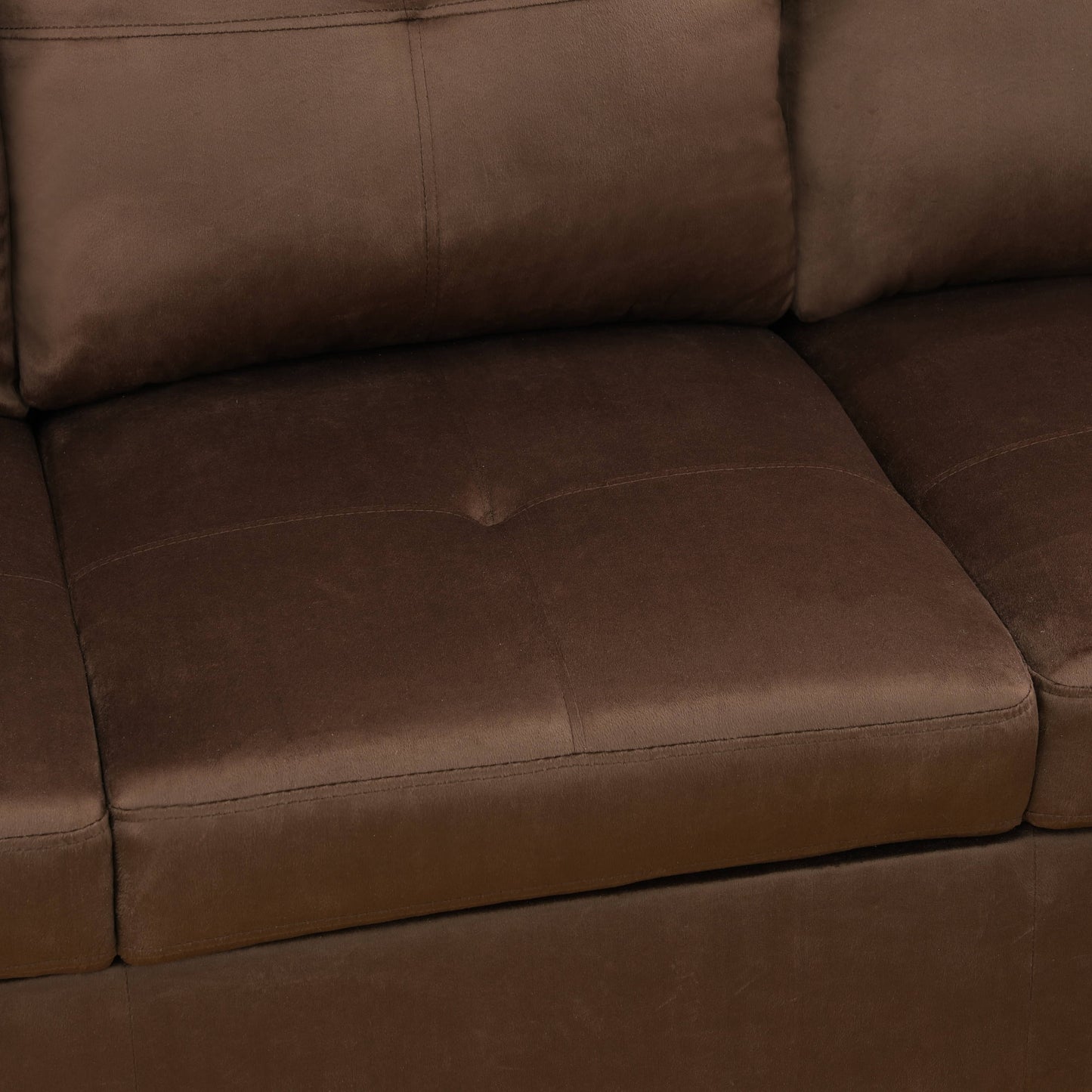 Close up of textured dark brown leather sofa seat with stitched details