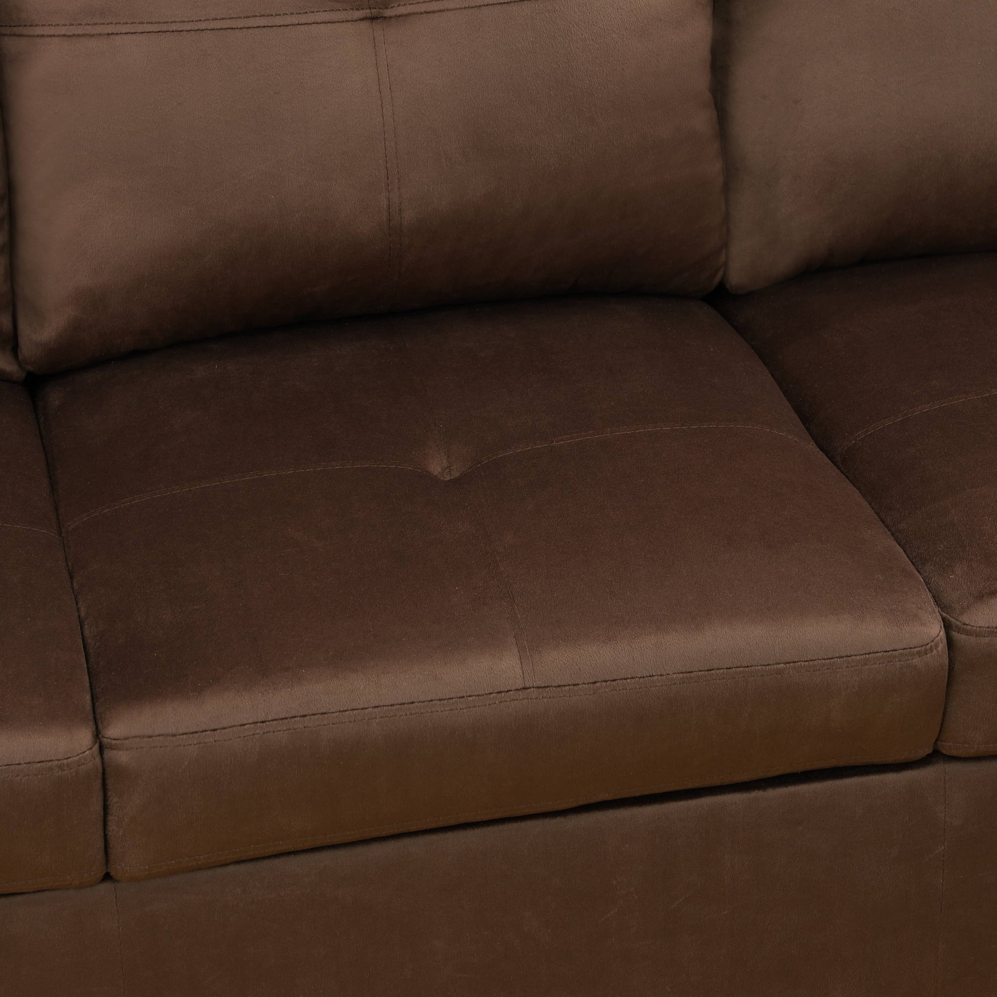 Close up of textured dark brown leather sofa seat with stitched details