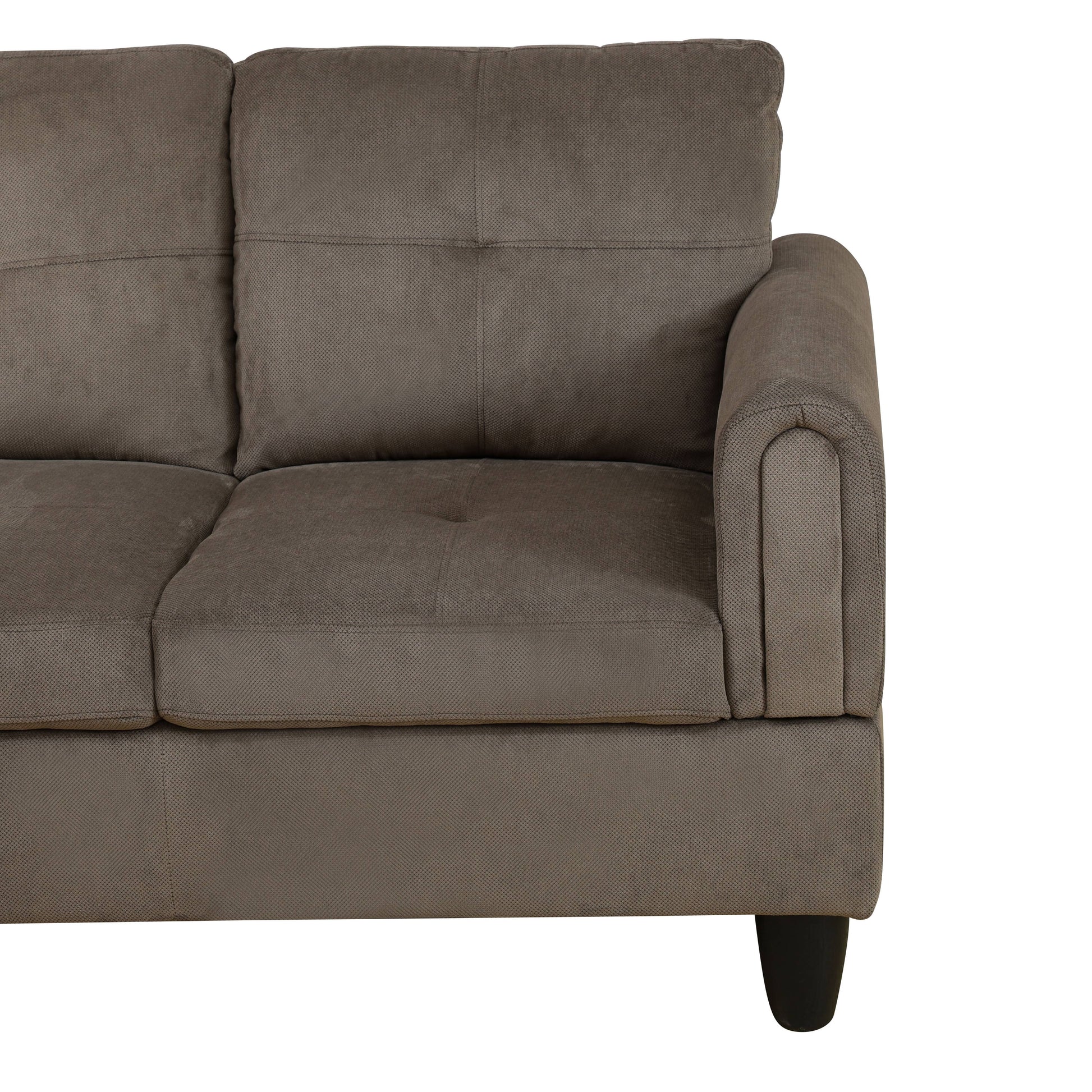 Taupe fabric sofa with tufted back cushions and rolled armrest