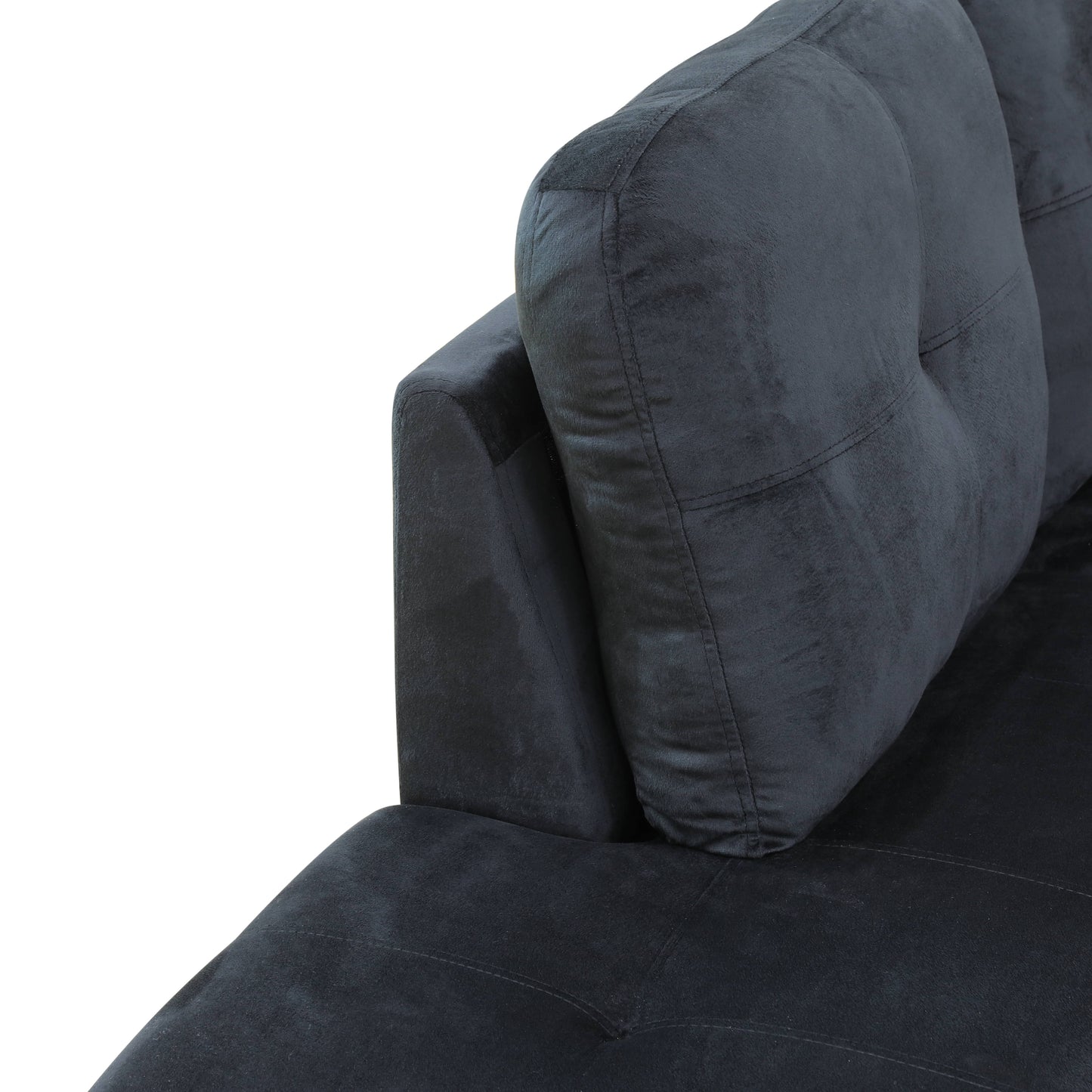 Dark grey plush fabric sectional sofa detail with deep stitching