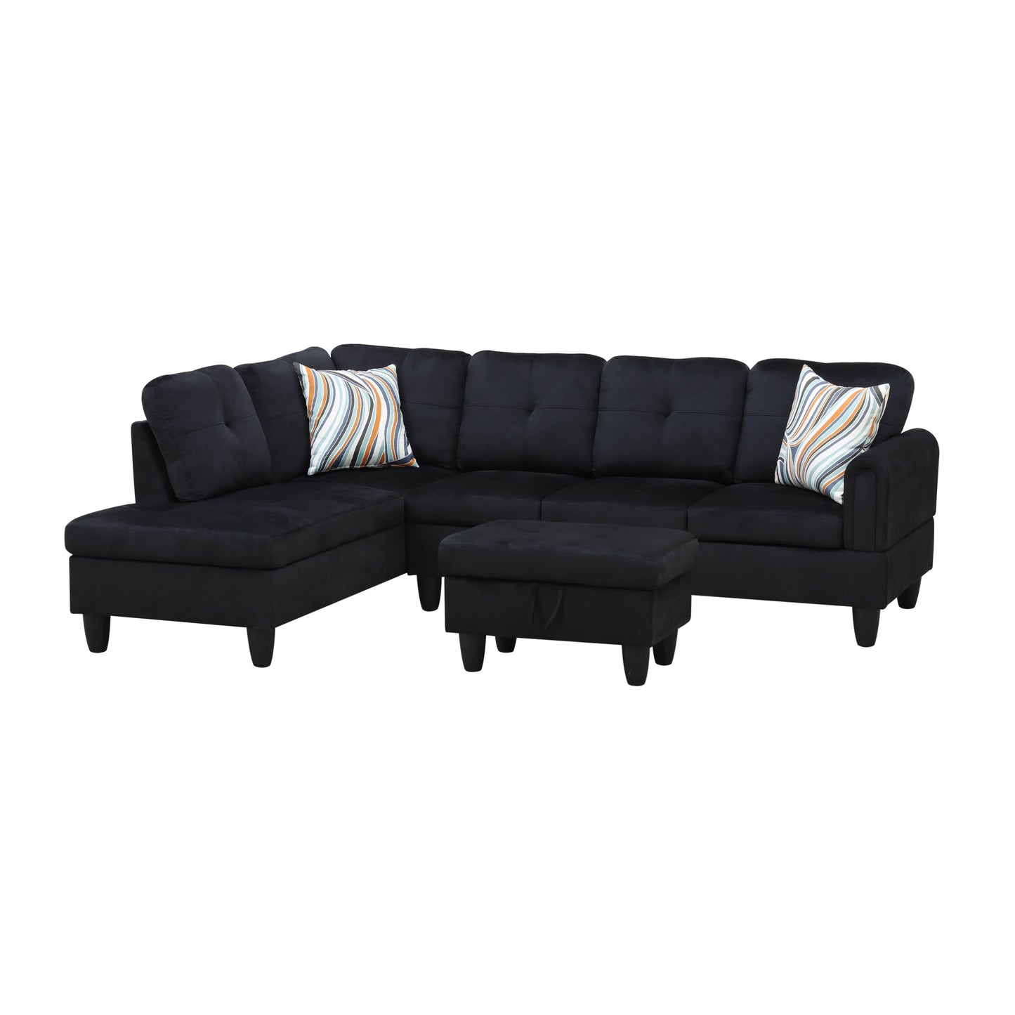 Black velvet sectional sofa with two decorative pillows and a matching ottoman