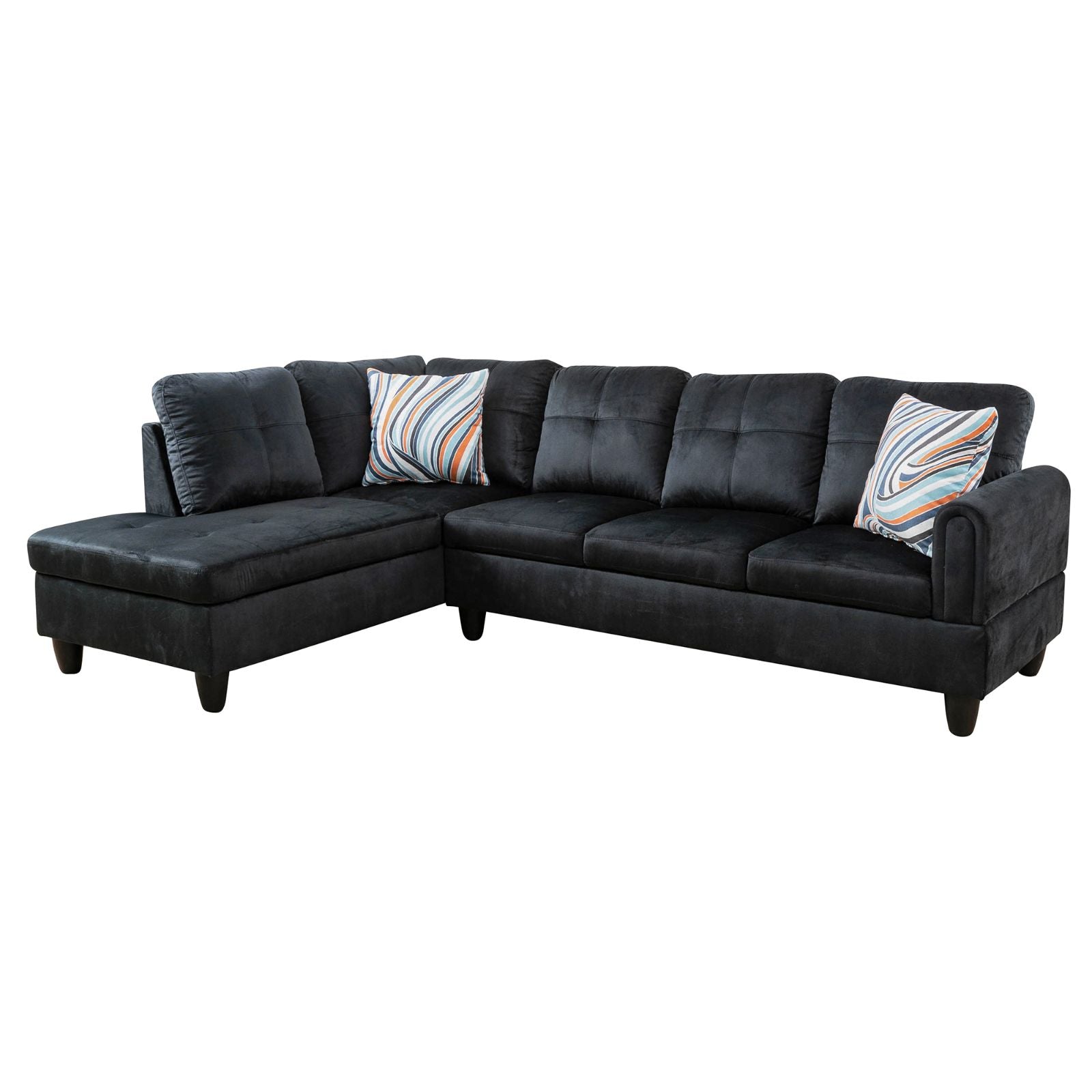 Black sectional sofa with plush cushions and two decorative throw pillows