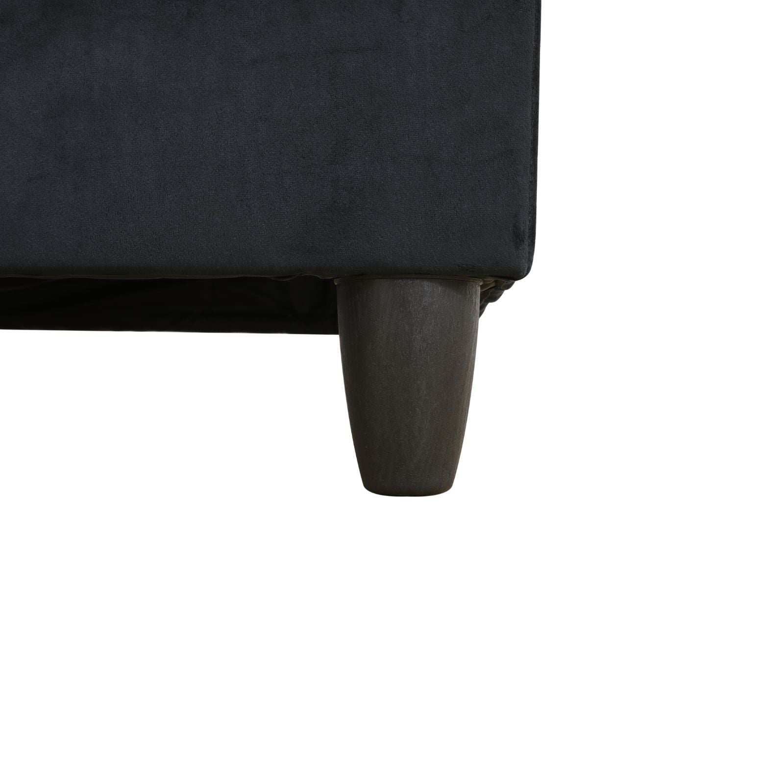 Dark grey velvet upholstered bed frame with a tapered wooden leg