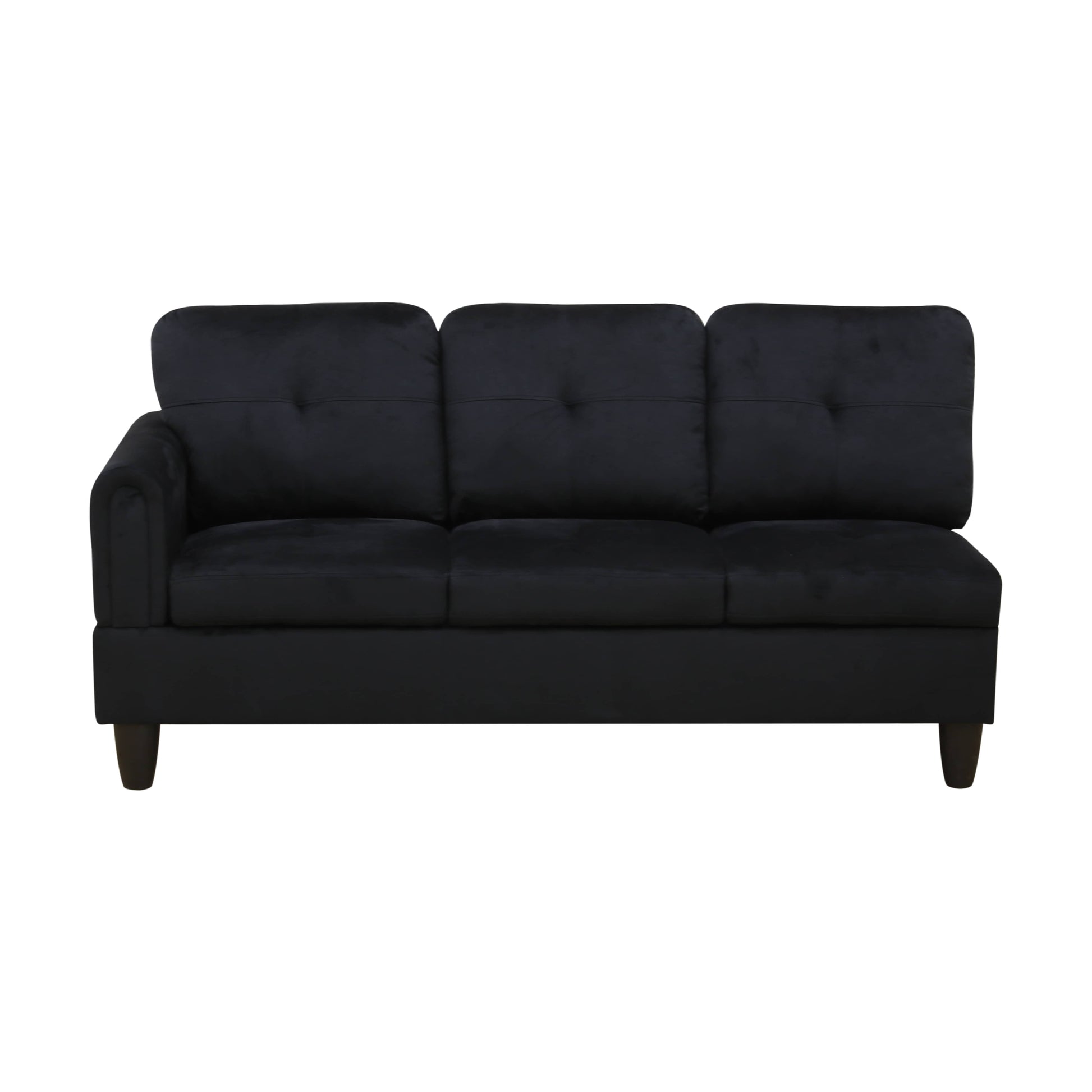 Tufted black velvet sofa with a chaise on the left