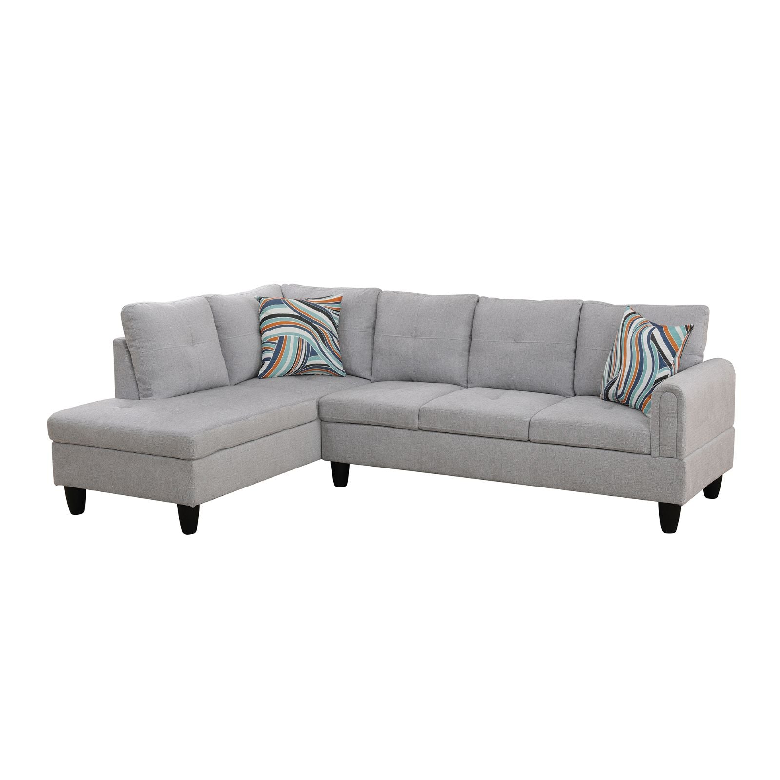 Gray fabric sectional sofa with two decorative pillows and tapered black legs
