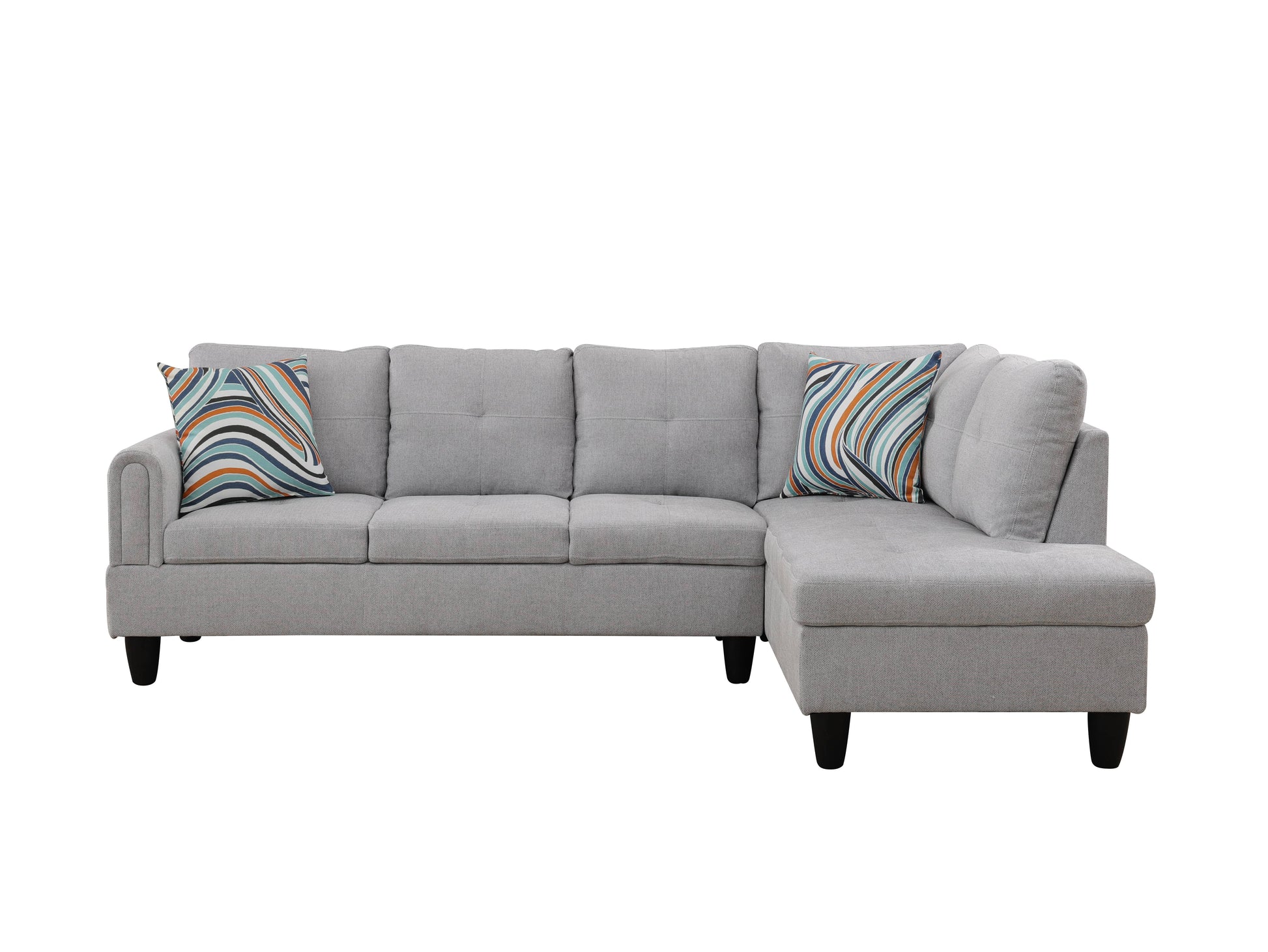 Gray fabric sectional sofa with colorful striped accent pillows