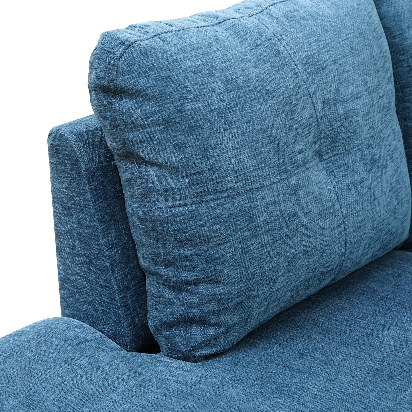 Close up of a textured blue fabric on a sofa cushion