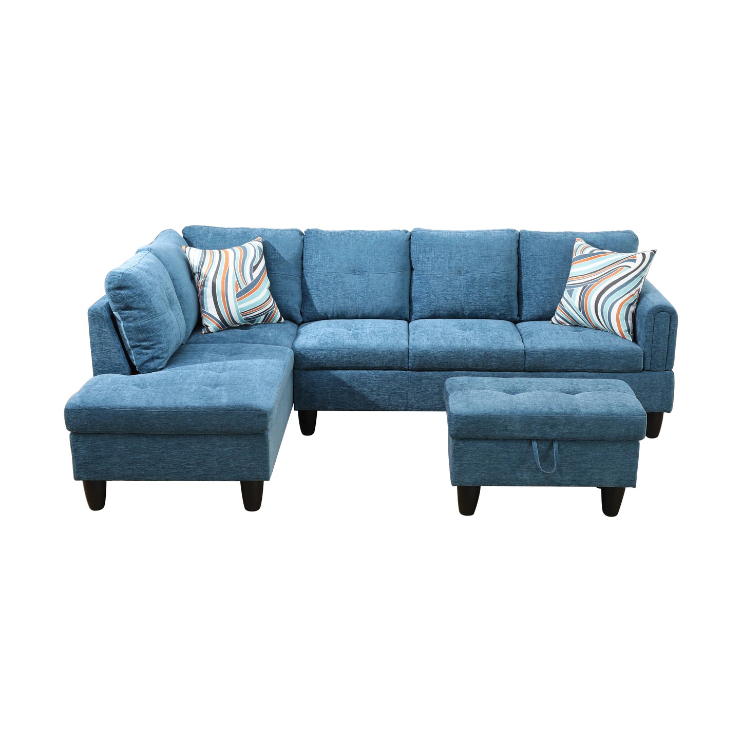 Blue fabric sectional sofa with chaise and ottoman featuring patterned accent pillows