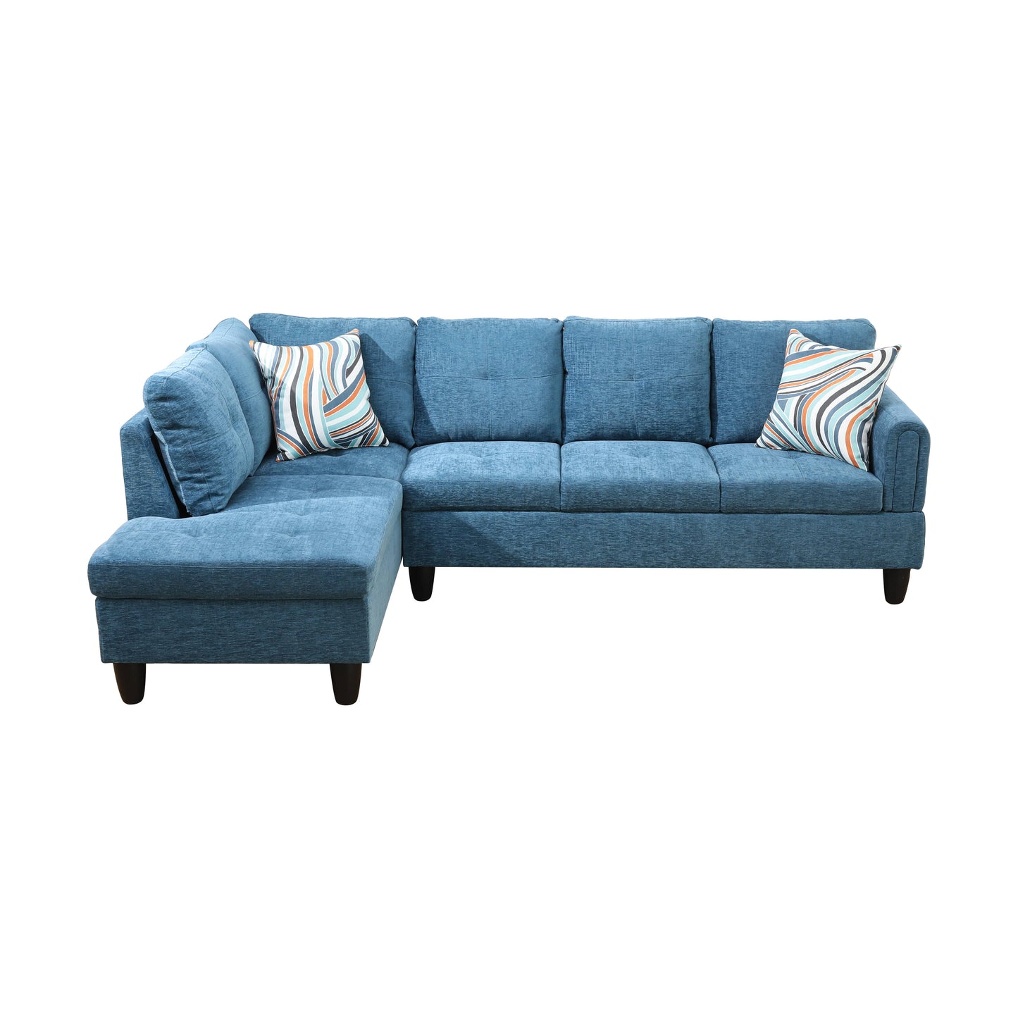 Blue fabric sectional sofa with chaise and two decorative throw pillows