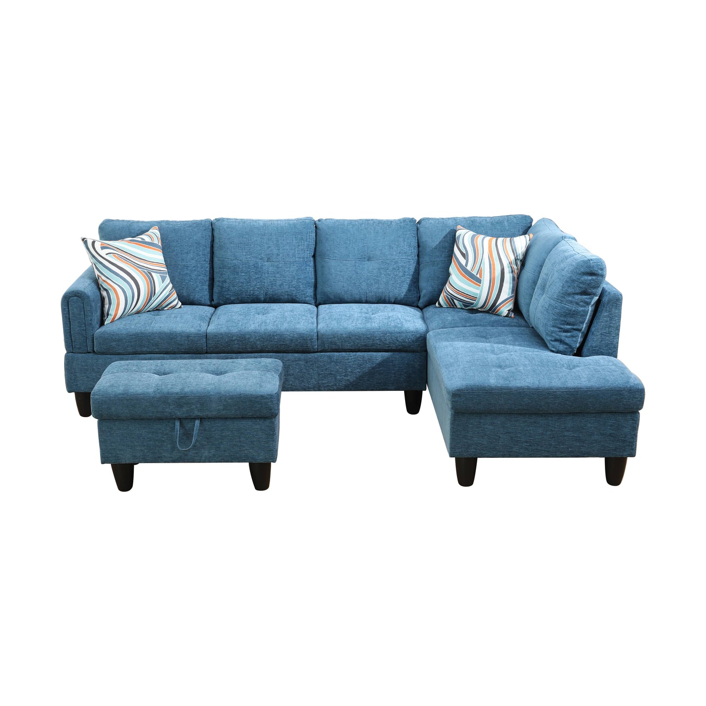 Deep blue fabric sectional sofa with tufted seats and decorative throw pillows