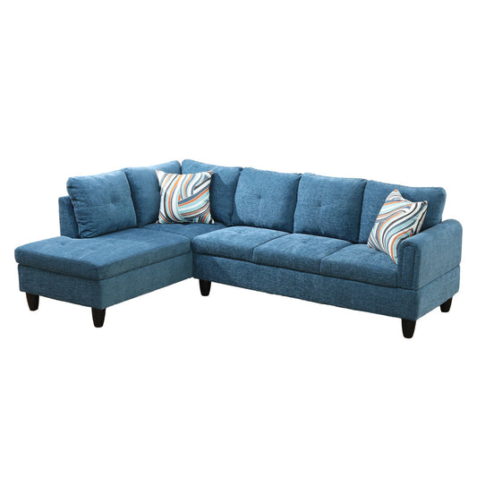 Blue fabric sectional sofa with chaise and decorative pillows