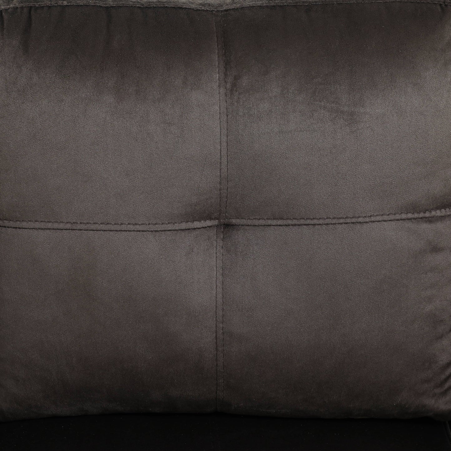 Dark grey velvet throw pillow with stitched detailing and plush texture