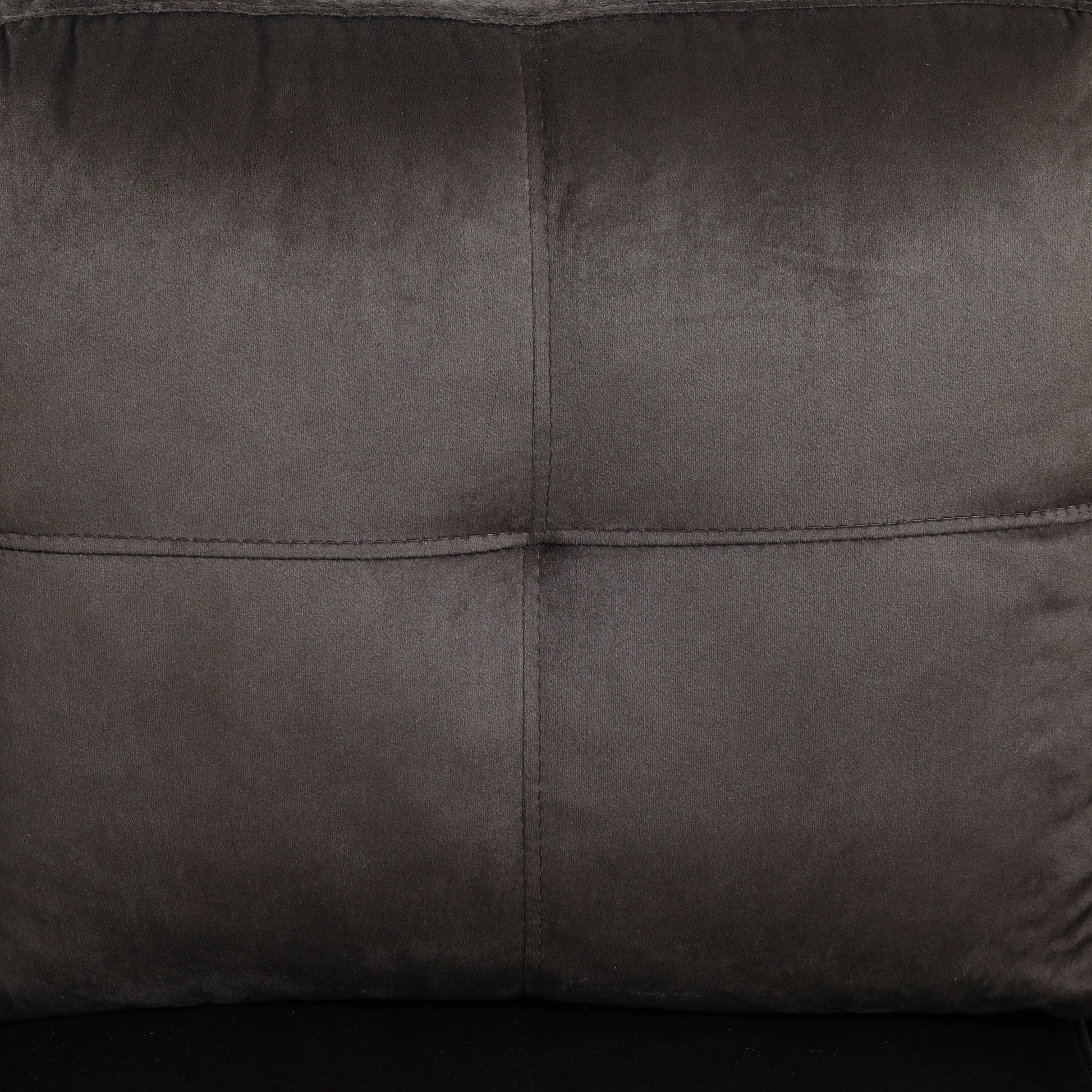 Dark grey velvet throw pillow with stitched detailing and plush texture