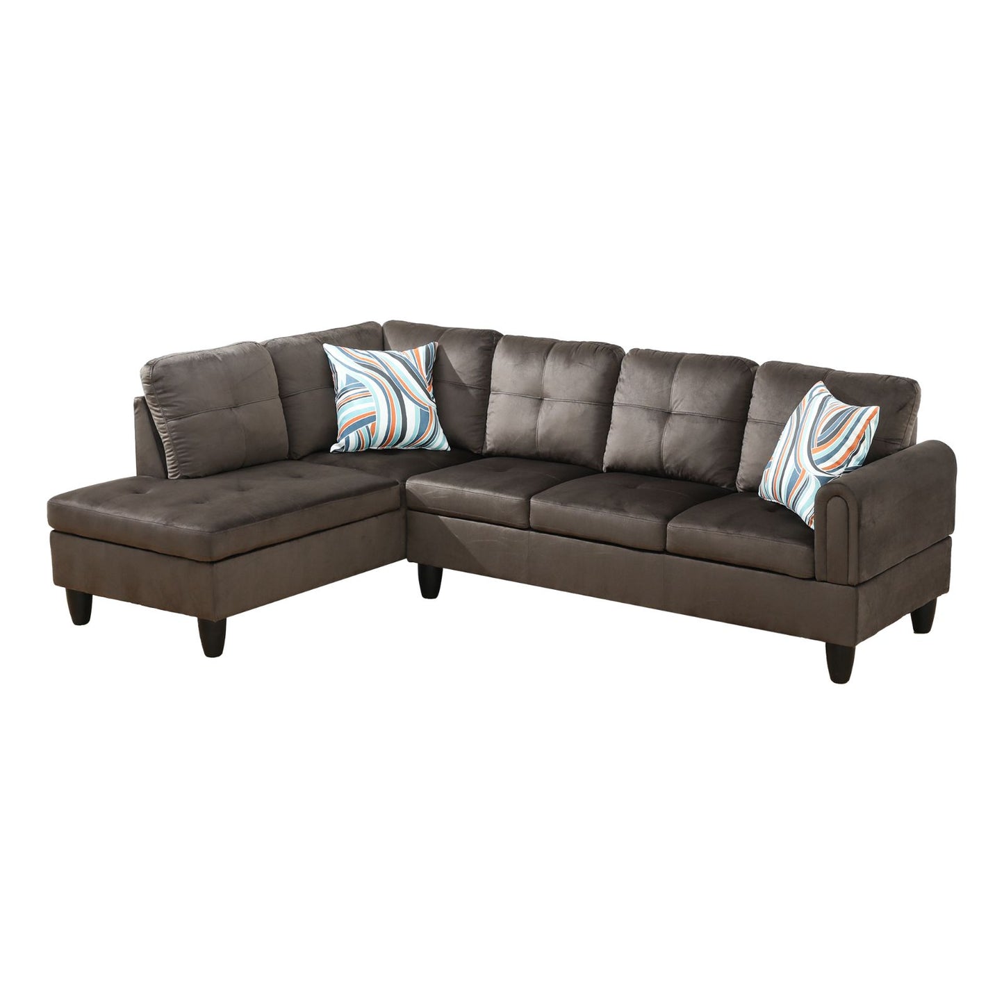 Dark brown velvet sectional sofa with tufted cushions and abstract patterned pillows