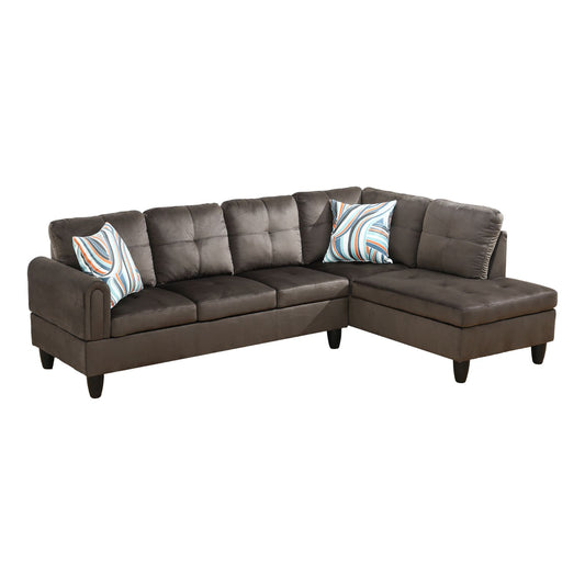 Dark brown tufted velvet sectional sofa with striped accent pillows