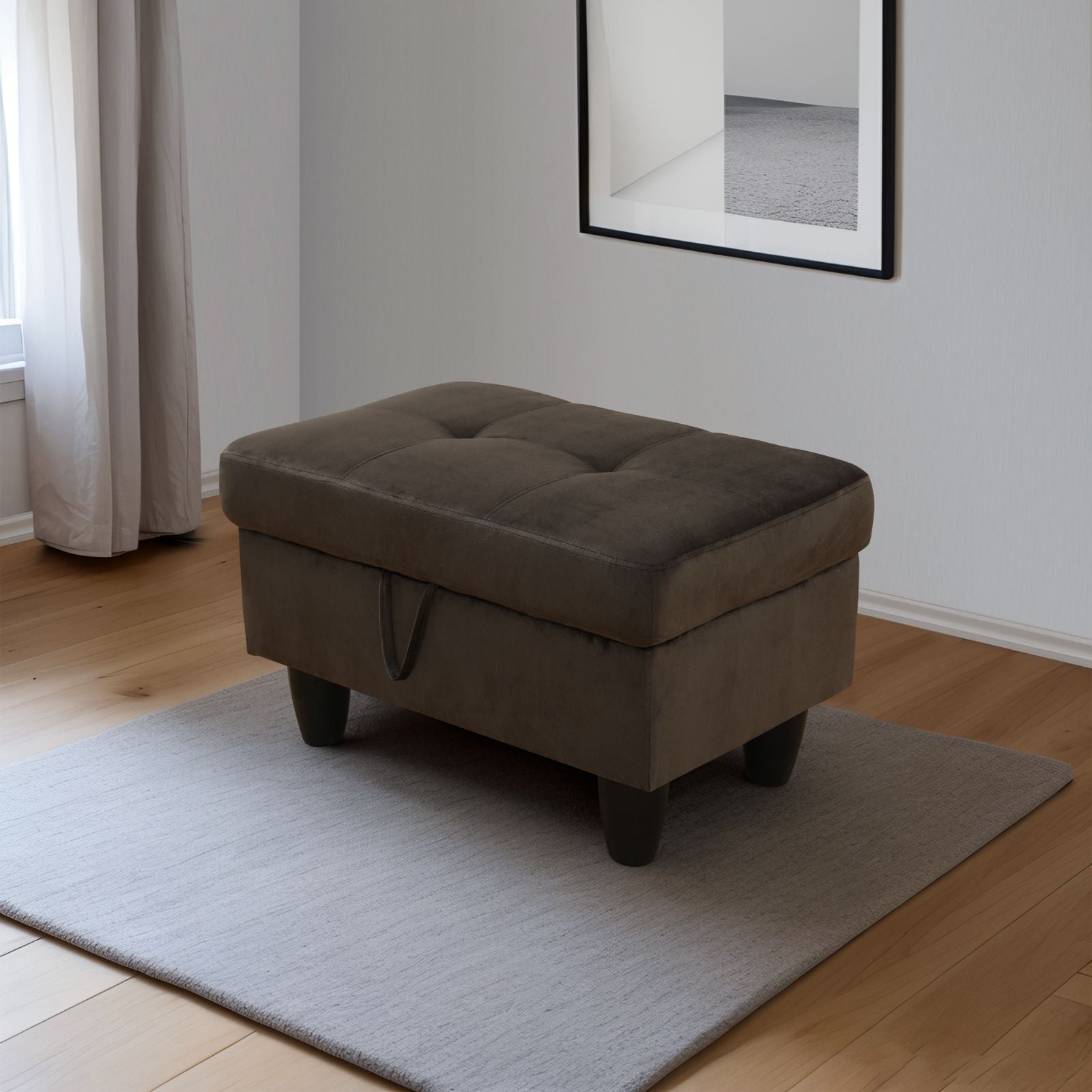 Dark brown tufted storage ottoman with dark wooden legs on a light grey rug