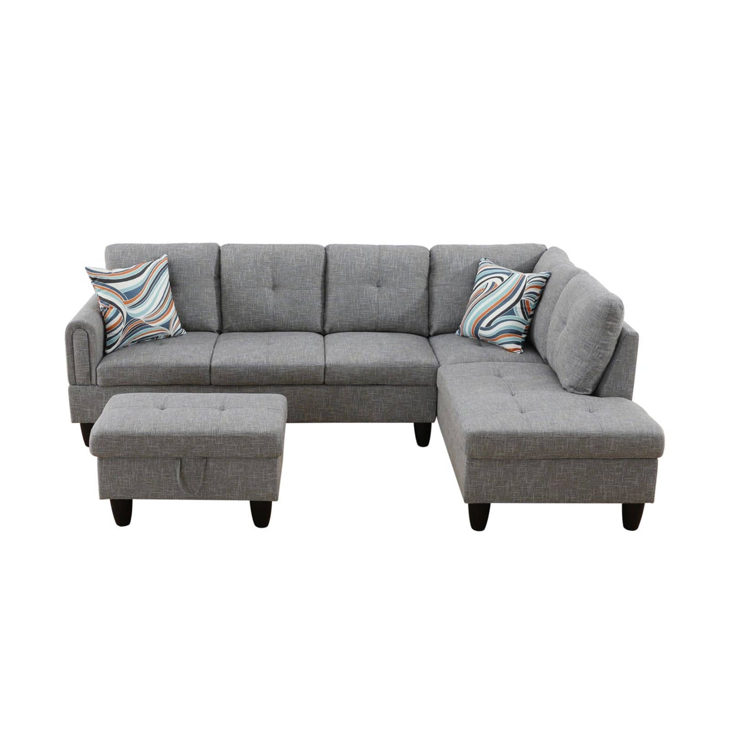 Gray fabric sectional sofa with ottoman and patterned accent pillows