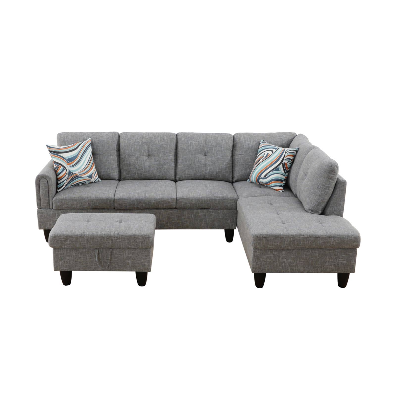 Gray fabric sectional sofa with ottoman and patterned accent pillows