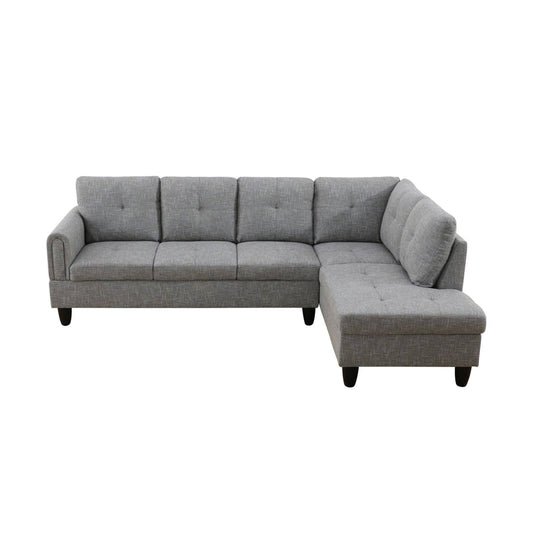 Gray linen sectional sofa with tufted cushions and ottoman