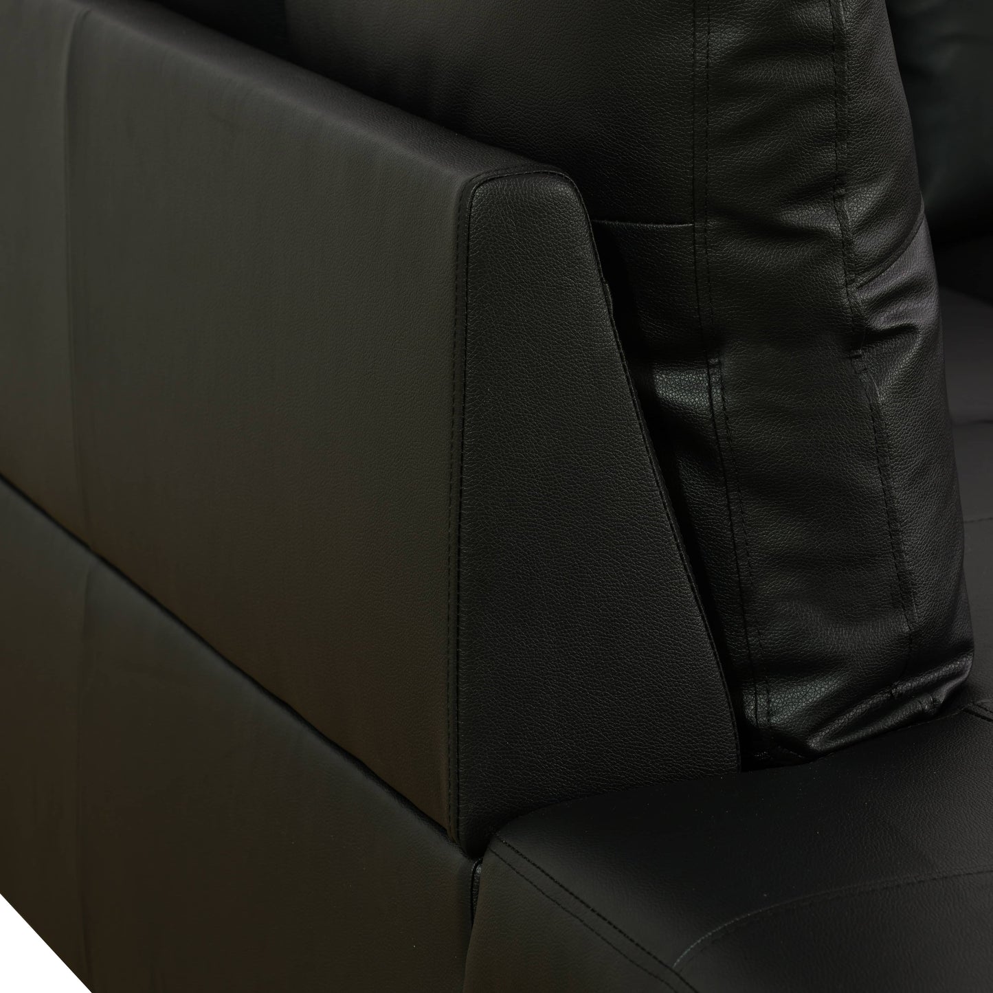 Black faux leather sectional sofa armrest detail