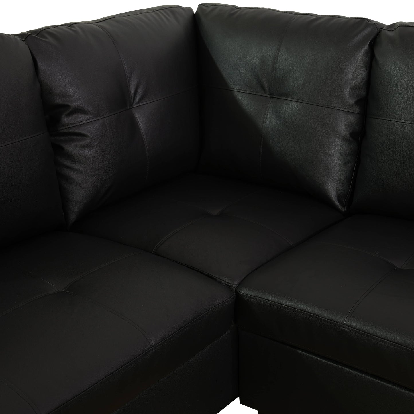 Black leather sectional sofa corner with tufted cushions