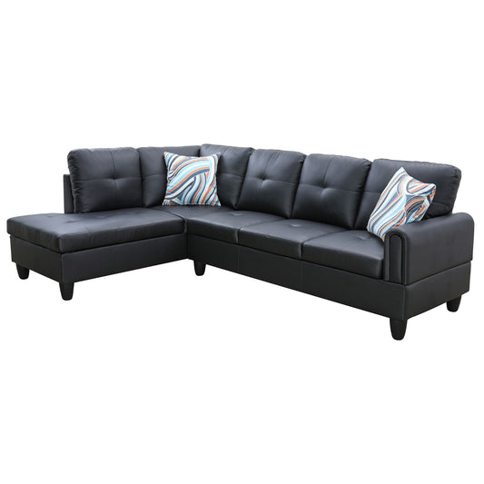 Black faux leather sectional sofa with tufted cushions and colorful throw pillows