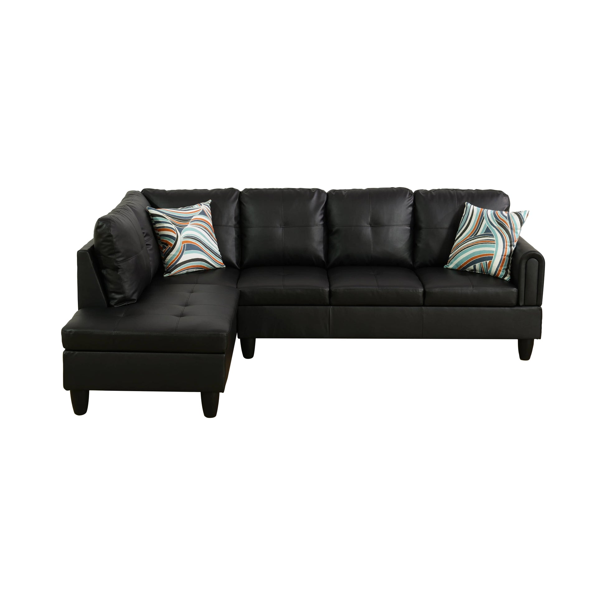 Black faux leather sectional sofa with tufted cushions and decorative pillows