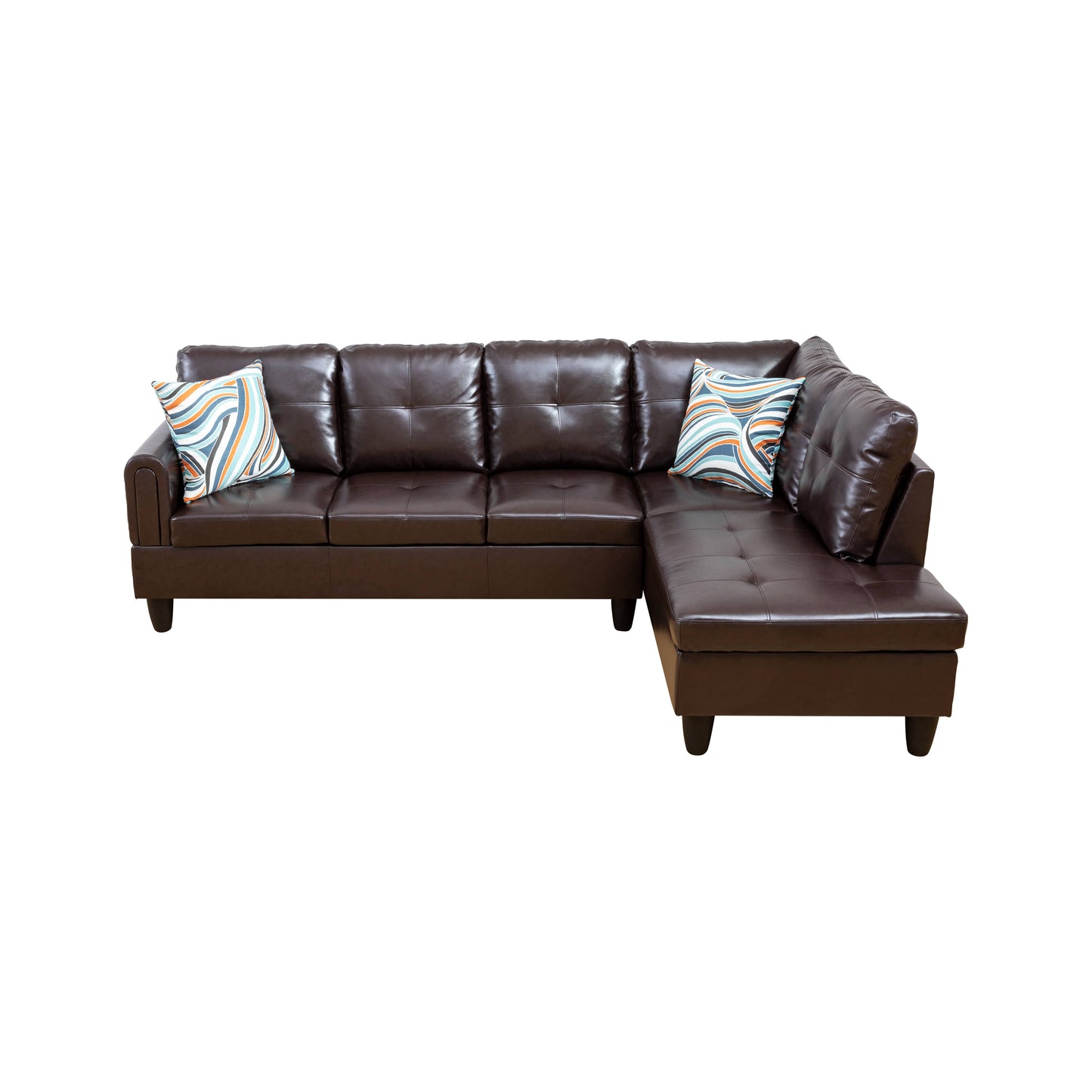 Dark brown tufted leather sectional sofa with geometric patterned accent pillows