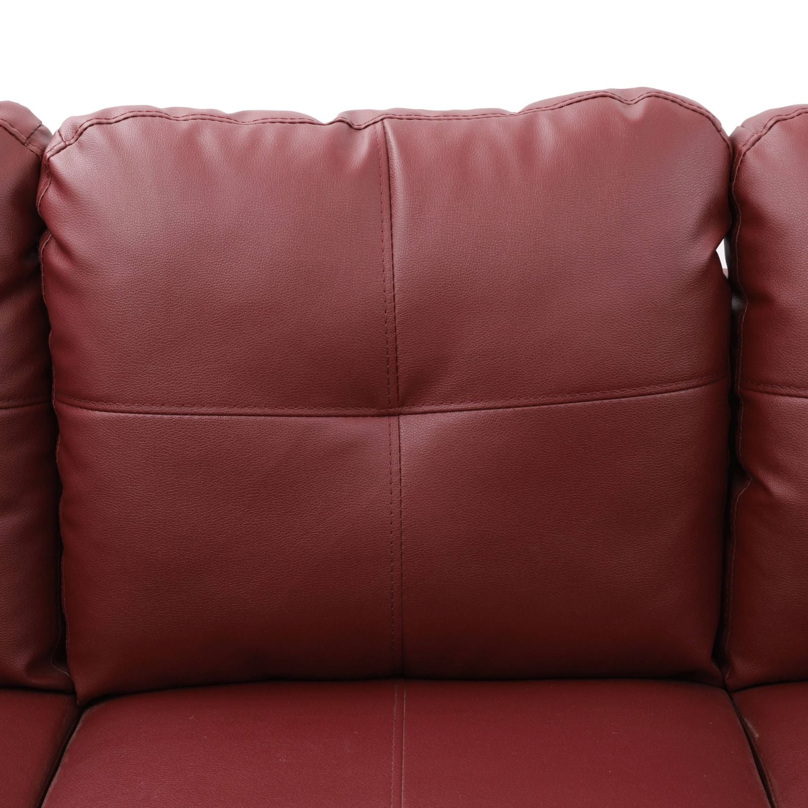 Deep red faux leather sofa cushion with tufted design