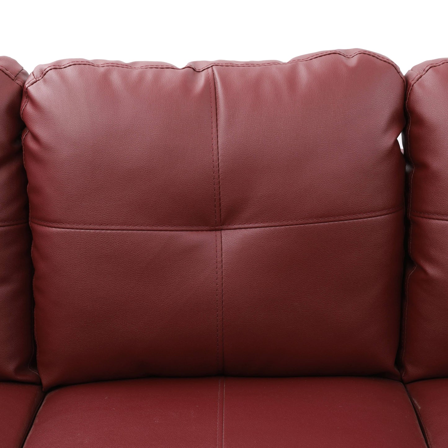 Red faux leather sofa cushion with detailed stitching