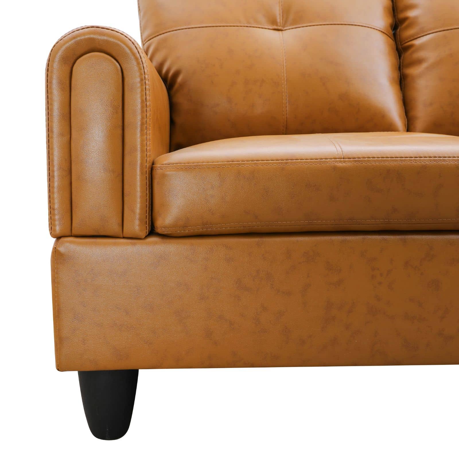 Tan faux leather sofa arm with stitched detailing