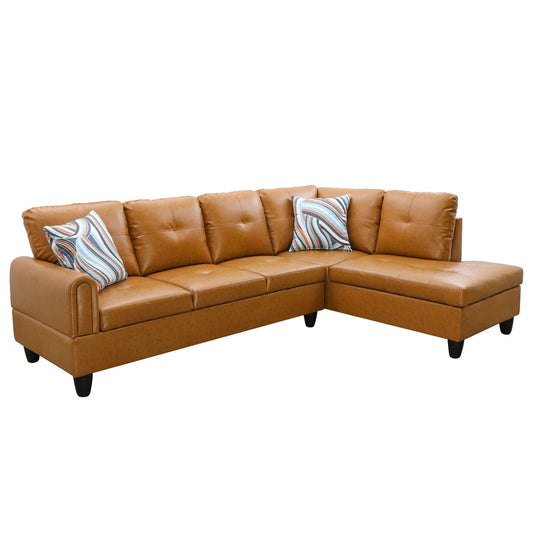 Brown faux leather sectional sofa with tufted cushions and striped throw pillows
