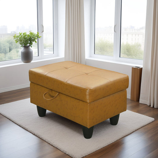 Tufted mustard faux leather storage ottoman with dark legs