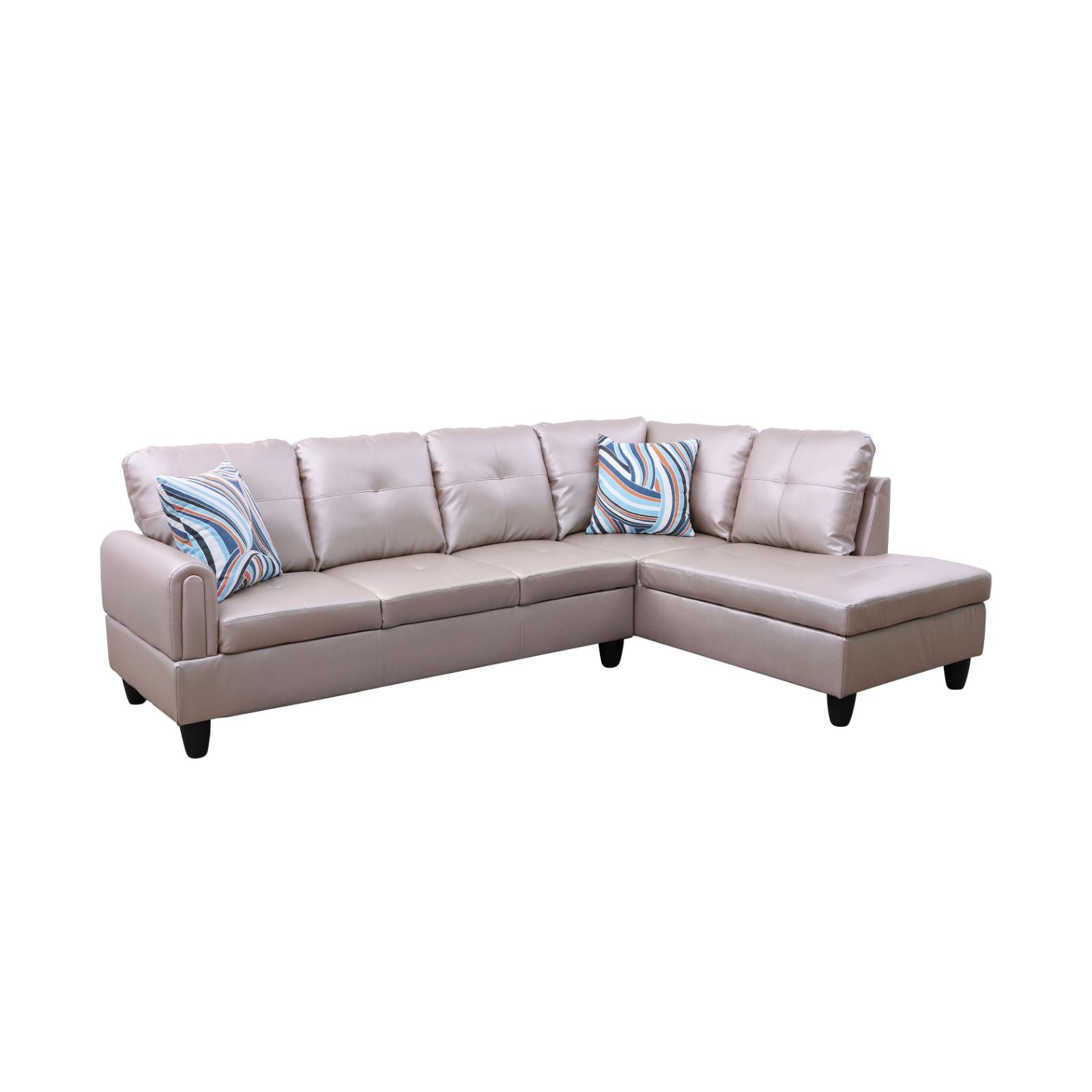 Beige leather sectional sofa with tufted cushions and striped decorative pillows