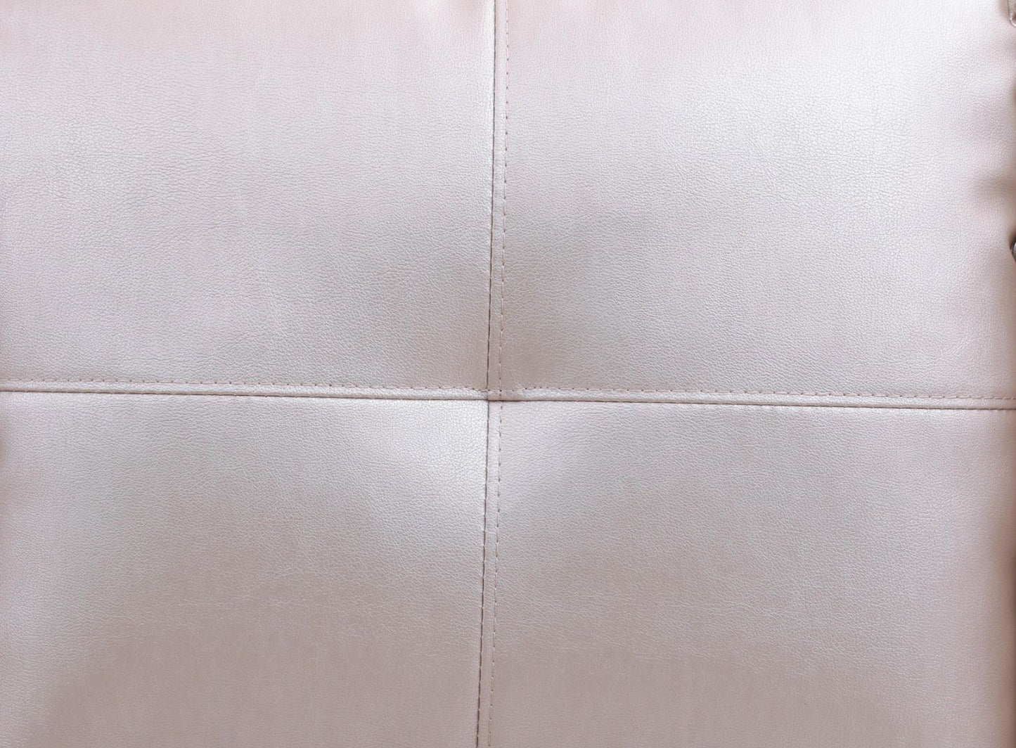 Pale pink faux leather upholstery with stitching detail