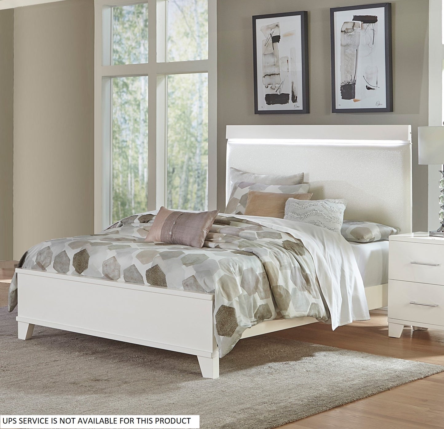 Modern white platform bed with upholstered headboard and LED light