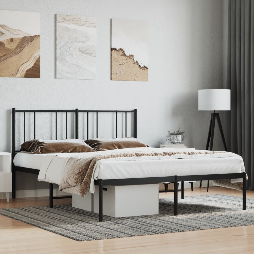 Black metal bed frame with a minimalist headboard and upholstered bedding