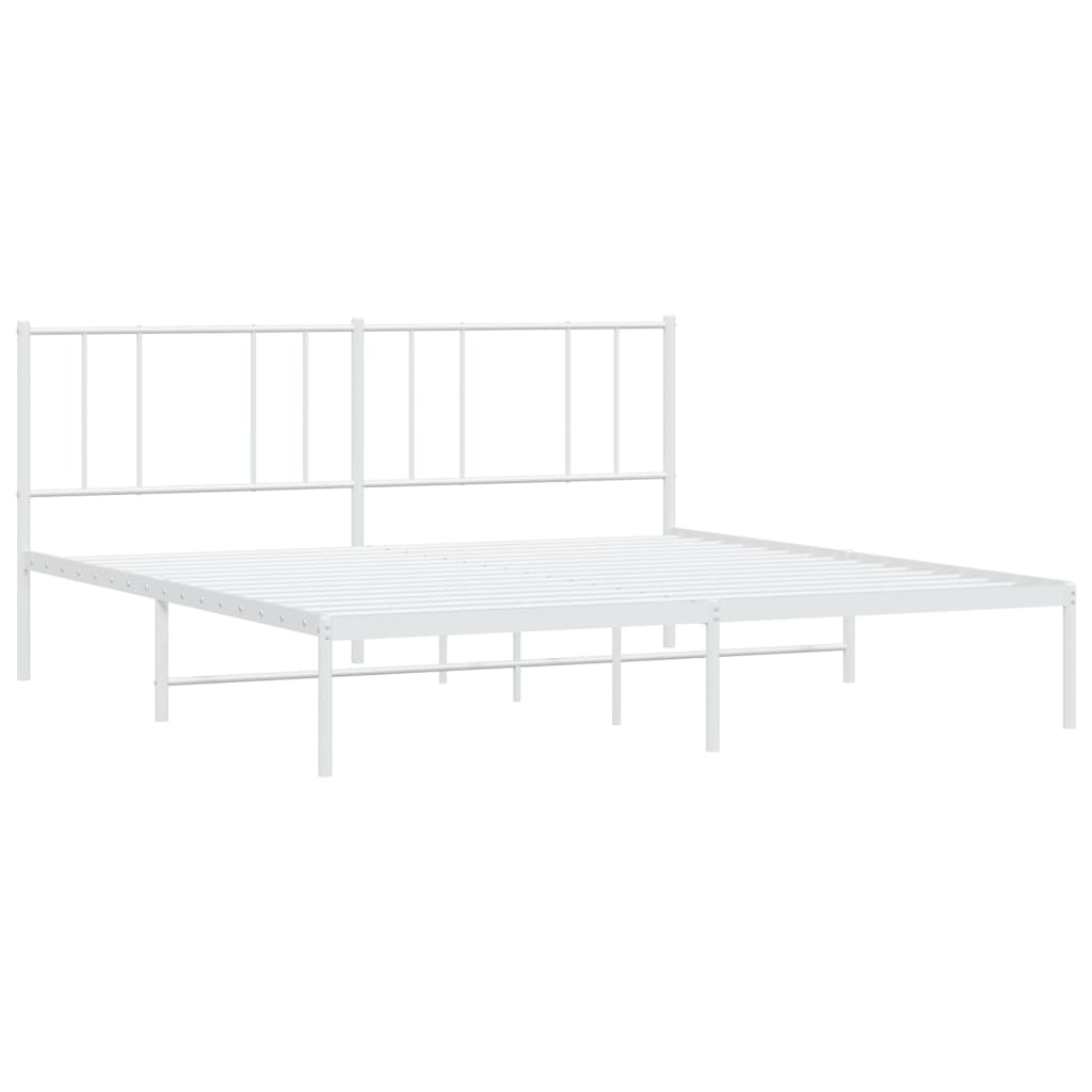 White metal bed frame with a minimalist design and a mattress
