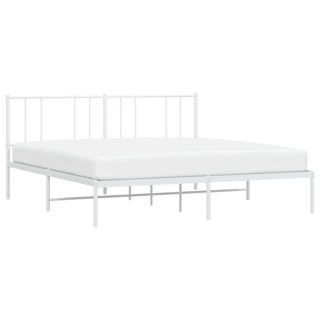White metal bed frame with a slatted base and vertical spindle headboard