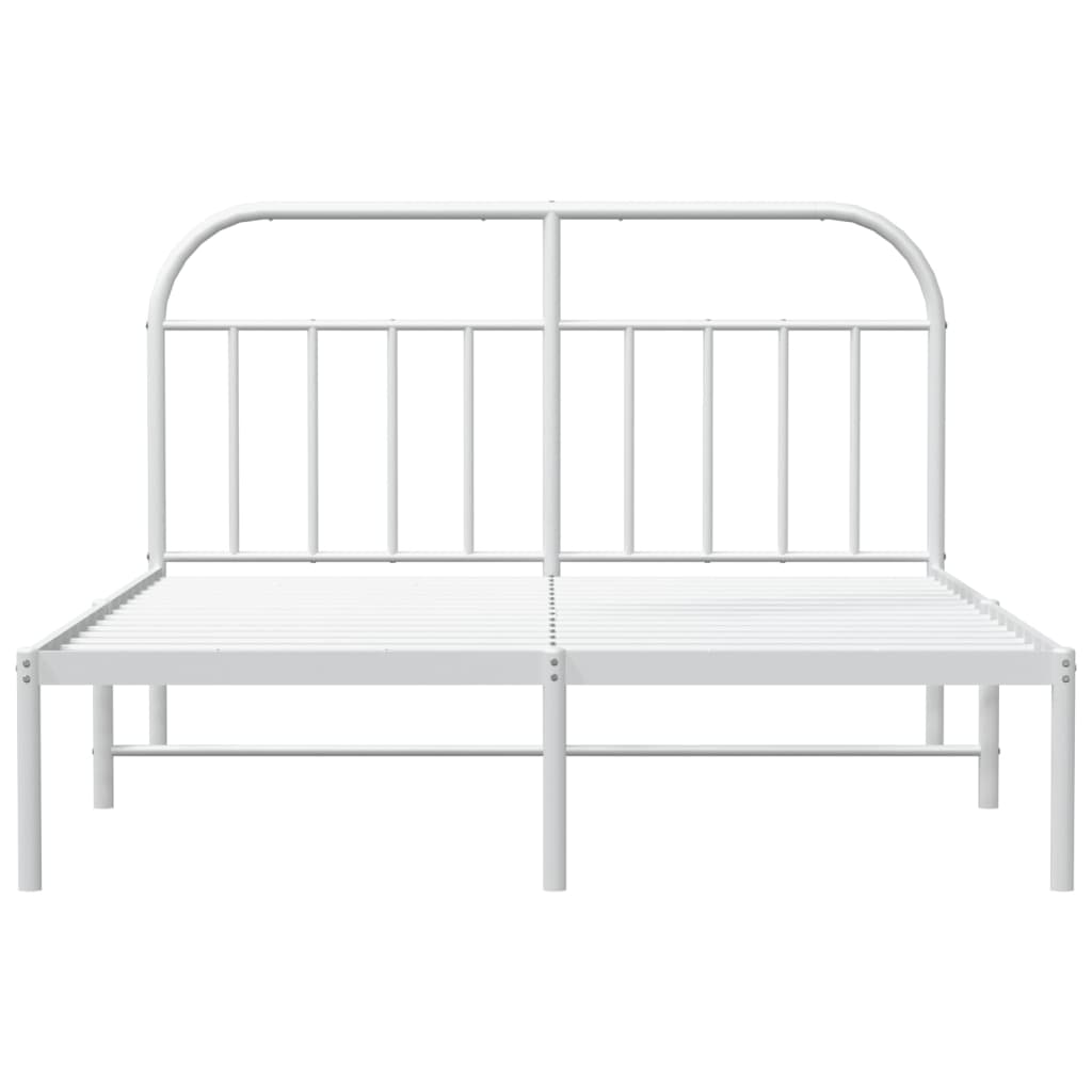 White metal twin bed frame with arched headboard and mattress