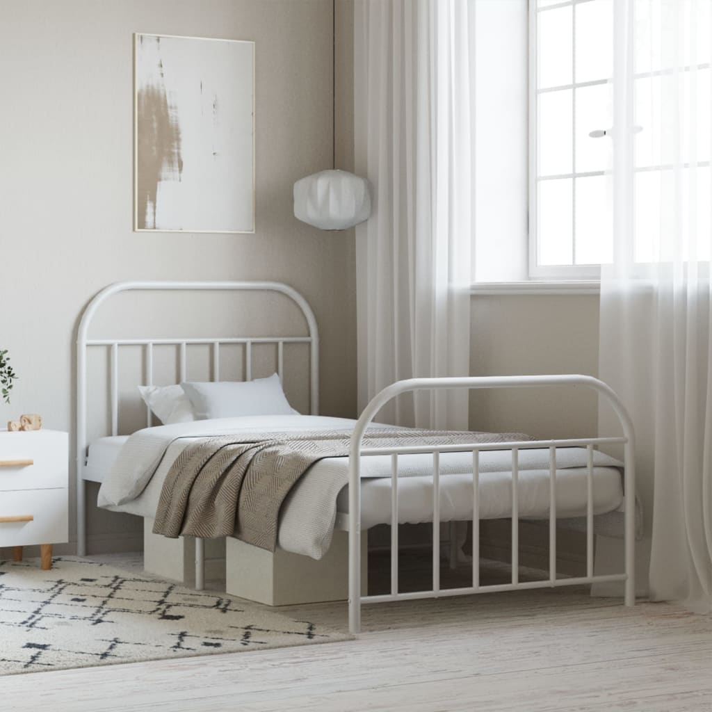 White metal twin bed frame with arched headboard and footboard