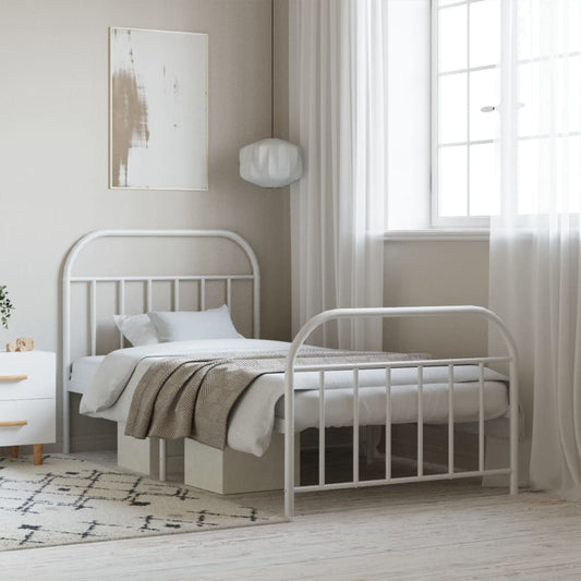 White metal twin bed frame with arched headboard and footboard