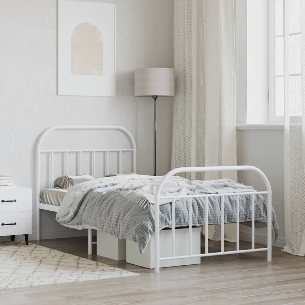 White metal twin bed frame with rounded headboard and footboard