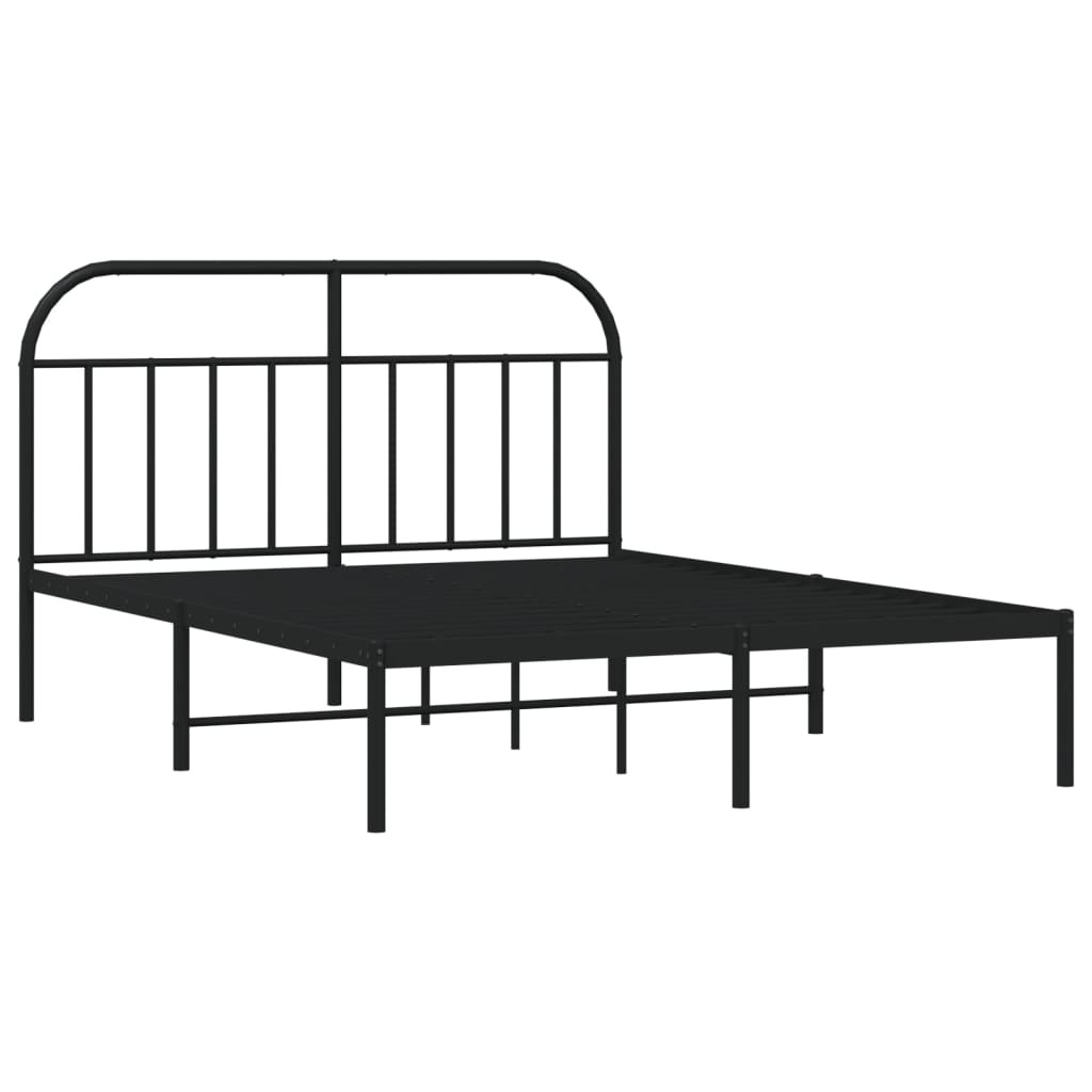 Black metal bed frame with a curved headboard and mattress